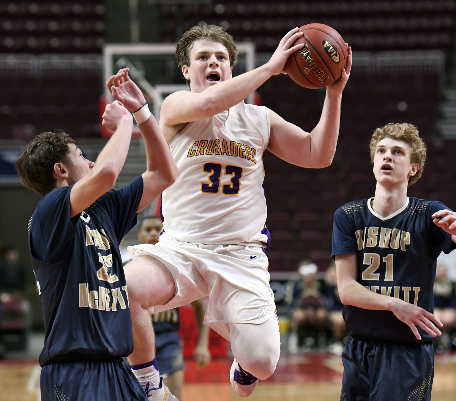 An all-state lineman in the fall, multifaceted Atkinson is also Lancaster Catholic's engine on the court
